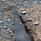 Images like this, which show formations likely created by flowing liquid, provided scientists with clues to Mars’ wet past. Taken by Opportunity on July 17, 2004.